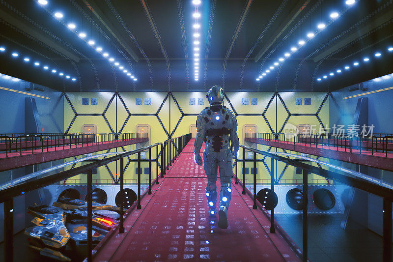 Astronaut in hangar bay walking towards spaceship